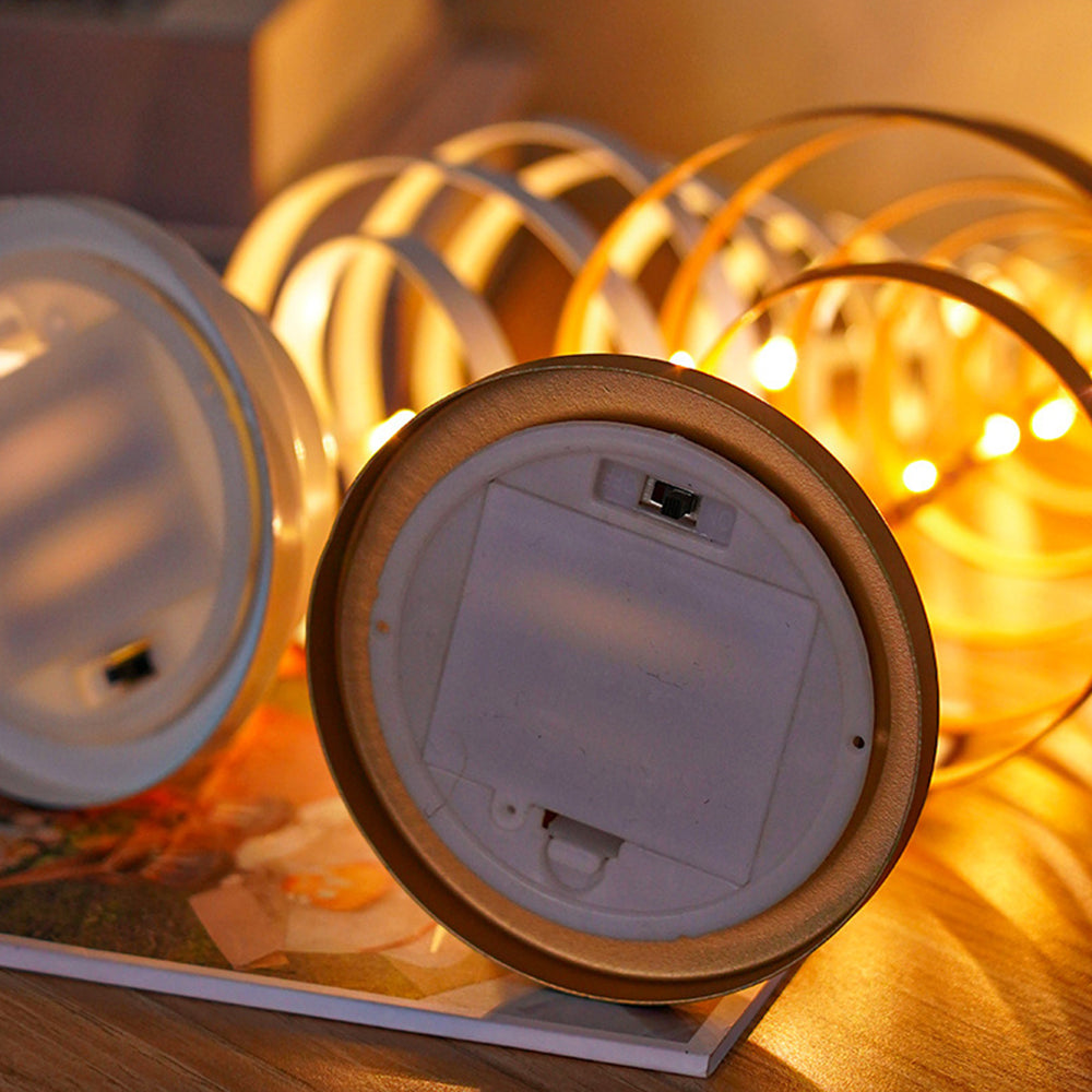 Lámpara de mesa con luces LED y árbol de metal