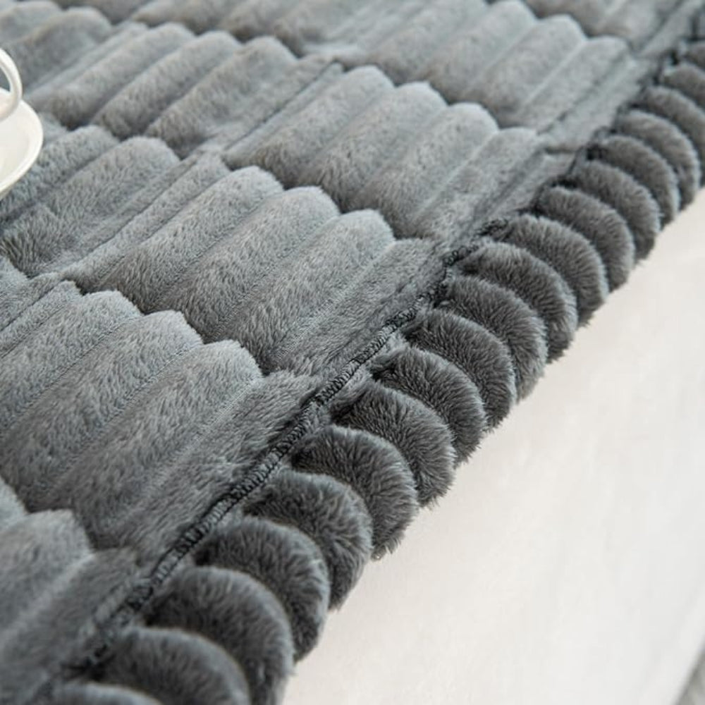 Housse de canapé en flanelle motif matelassé