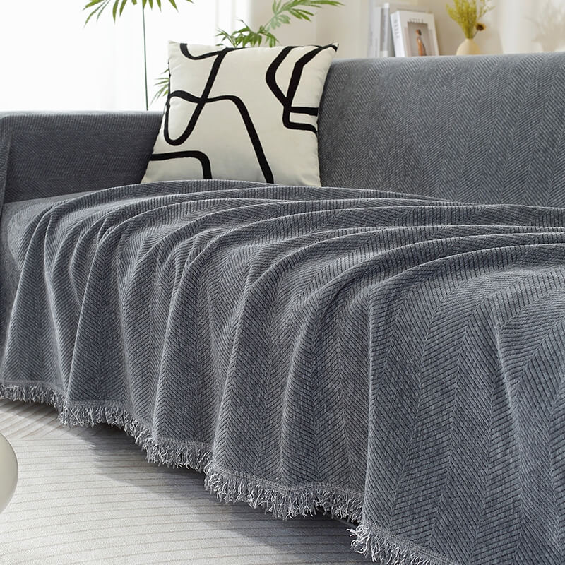 Housse de canapé en chenille motif chevrons avec franges