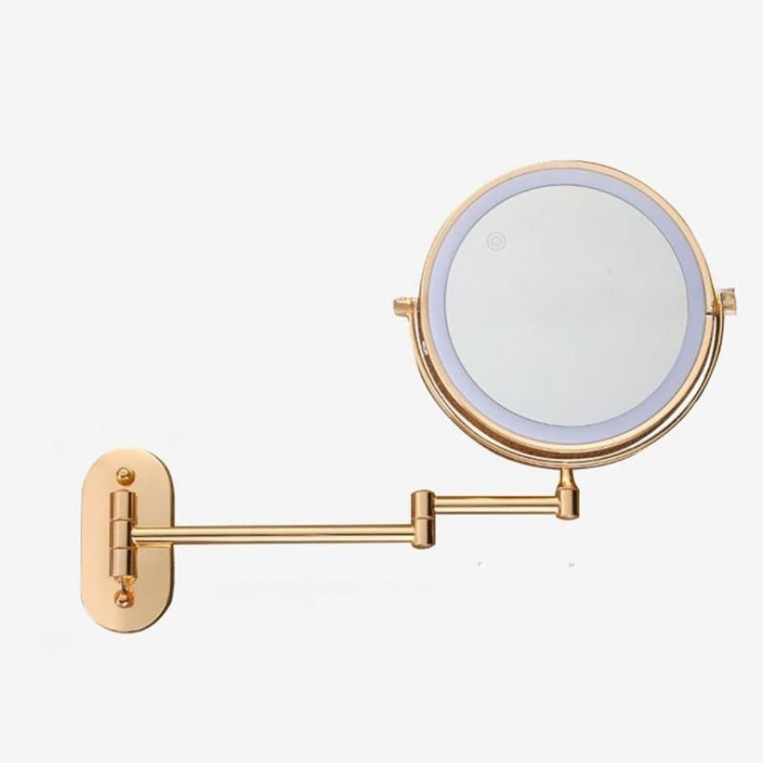 Specchio da parete LED con finitura oro e lente d'ingrandimento