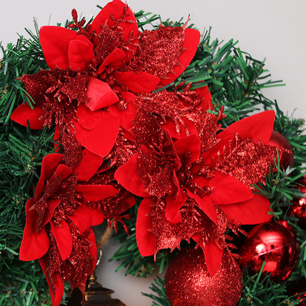 Weihnachtskranz mit LED-Lichtern und Schleife