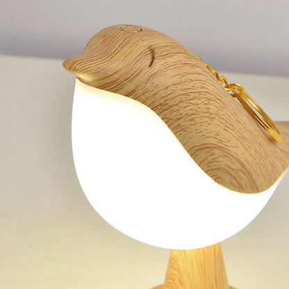 Moderne Holz-LED-Tischlampe im Vogel-Design