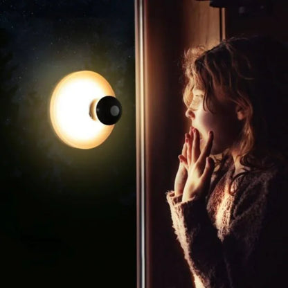 LED wall light with rechargeable suction mount