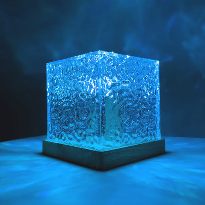 Lámpara de mesa LED con efecto de ondas de agua
