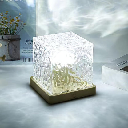 Lámpara de mesa LED con efecto de ondas de agua