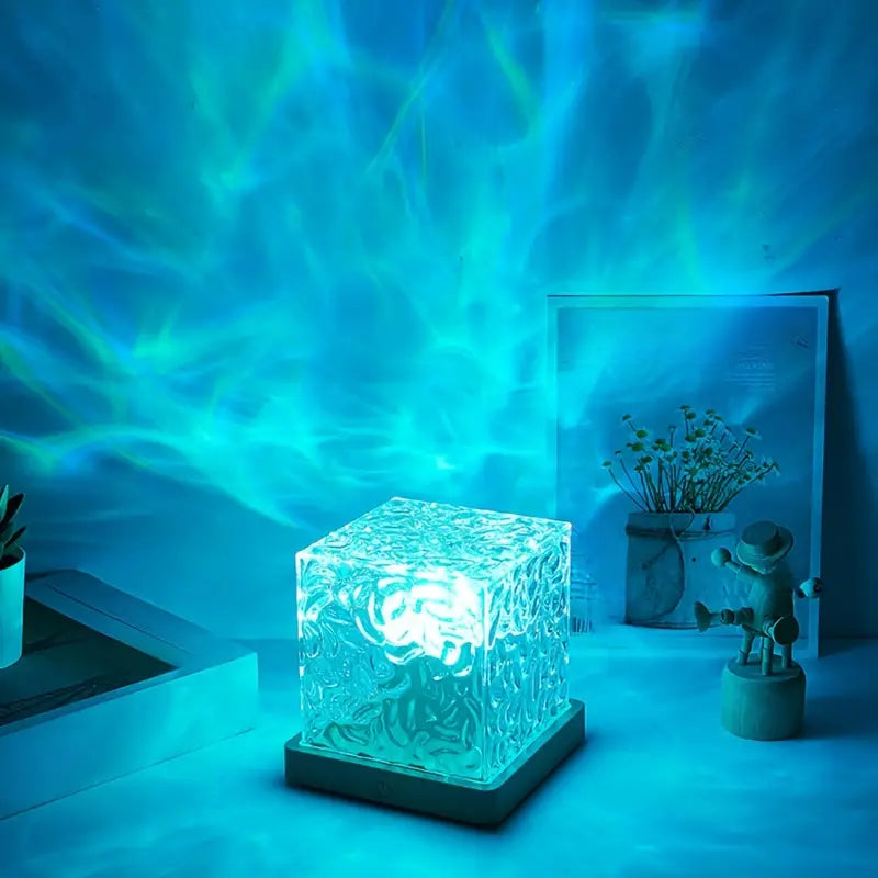 Lámpara de mesa LED con efecto de ondas de agua