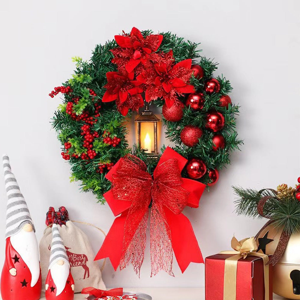 Weihnachtskranz mit LED-Lichtern und Schleife