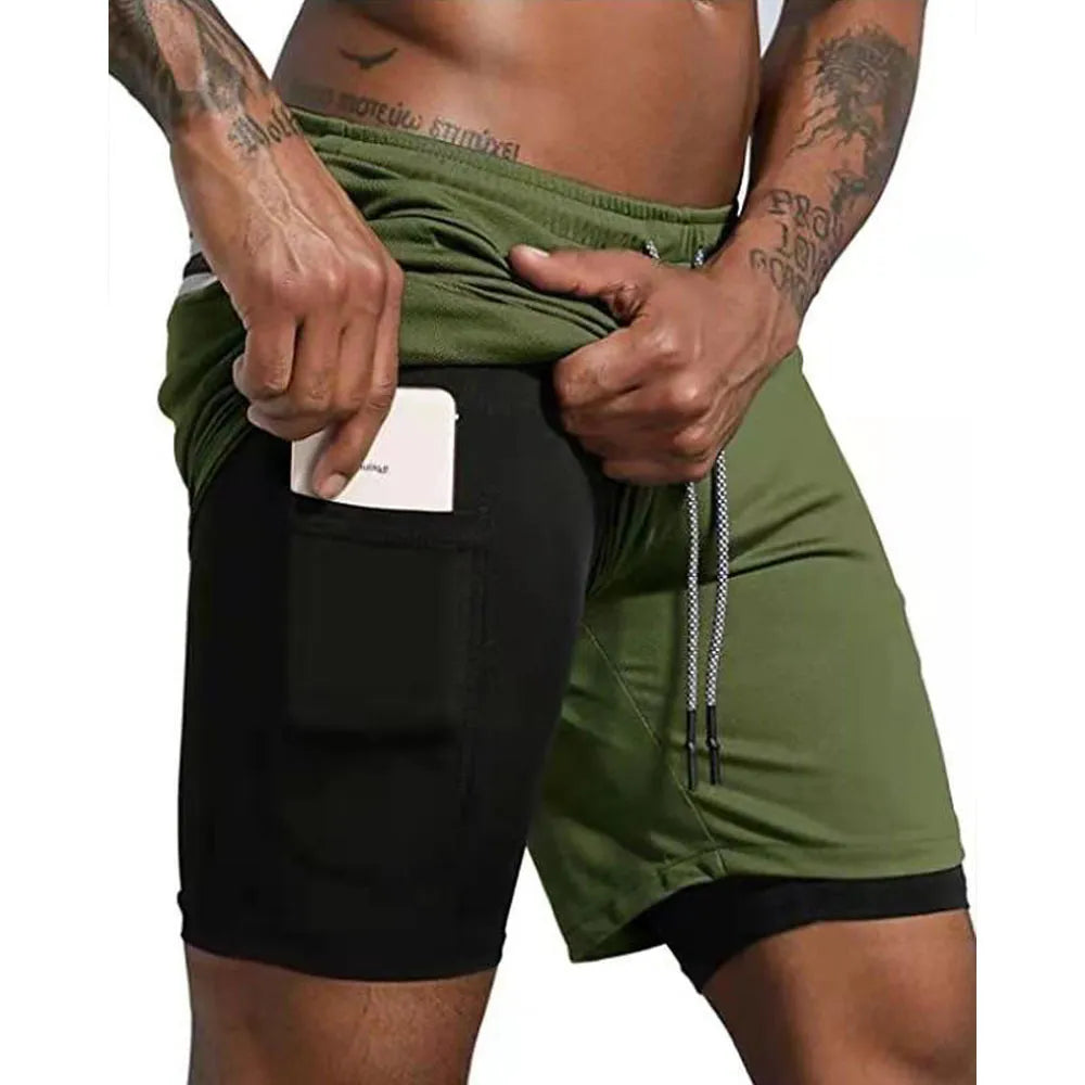 Pantalones cortos de gimnasio con bolsillo para teléfono y forro