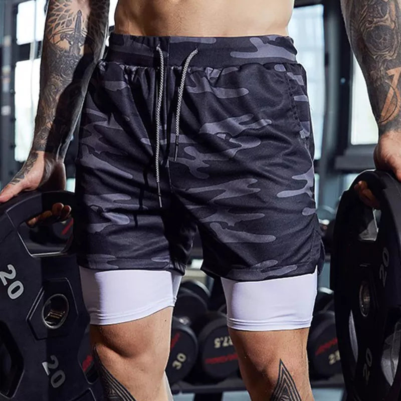 Pantalones cortos de gimnasio con bolsillo para teléfono y forro