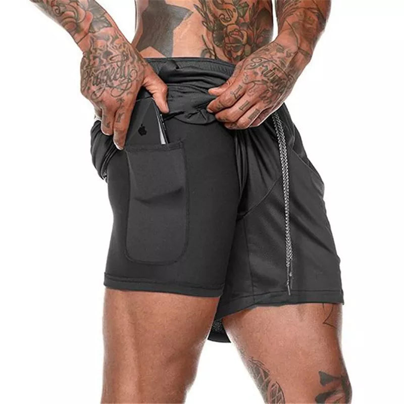 Pantalones cortos de gimnasio con bolsillo para teléfono y forro