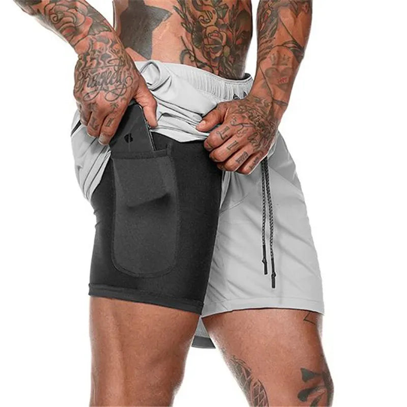 Pantalones cortos de gimnasio con bolsillo para teléfono y forro