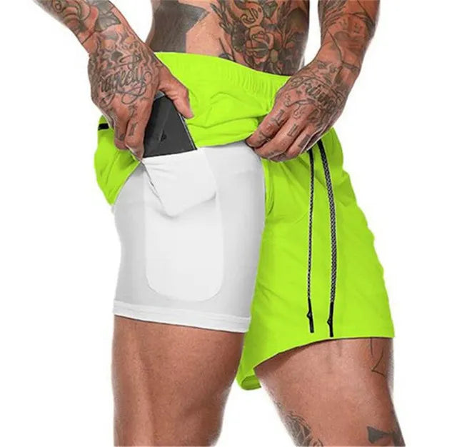 Pantalones cortos de gimnasio con bolsillo para teléfono y forro