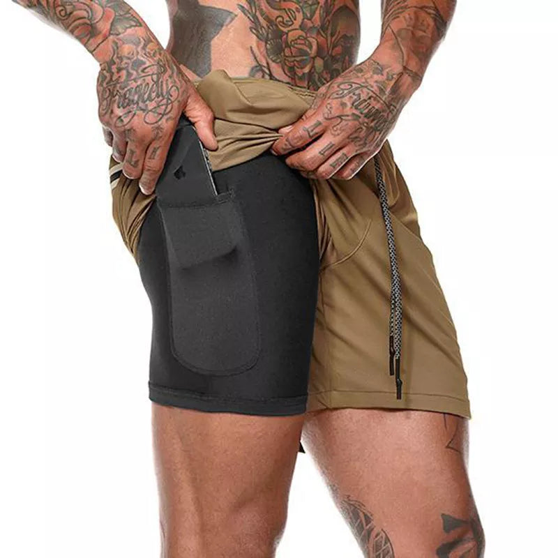Pantalones cortos de gimnasio con bolsillo para teléfono y forro