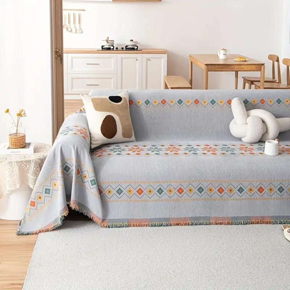 Housse de canapé bohème à pompons en mélange de coton