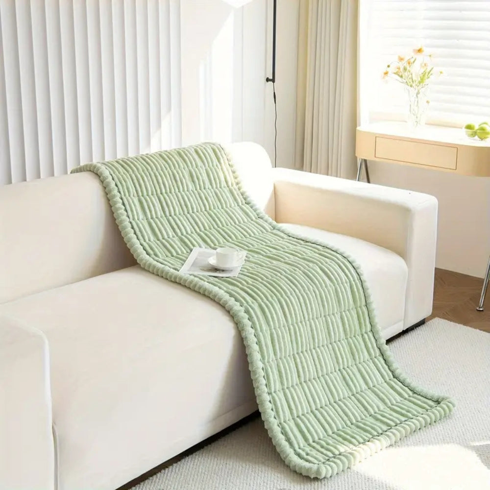 Housse de canapé en flanelle motif matelassé