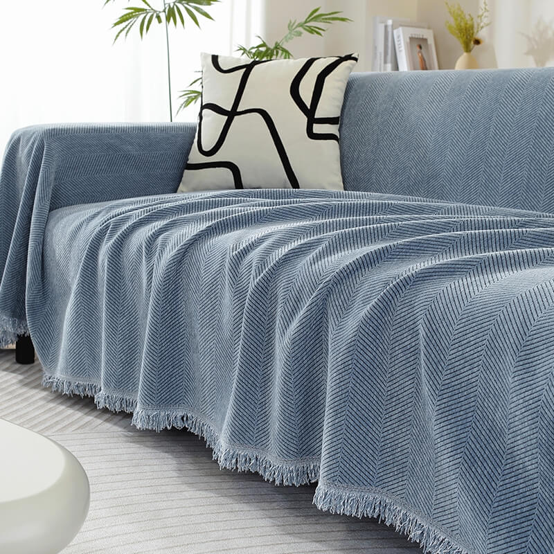 Housse de canapé en chenille motif chevrons avec franges