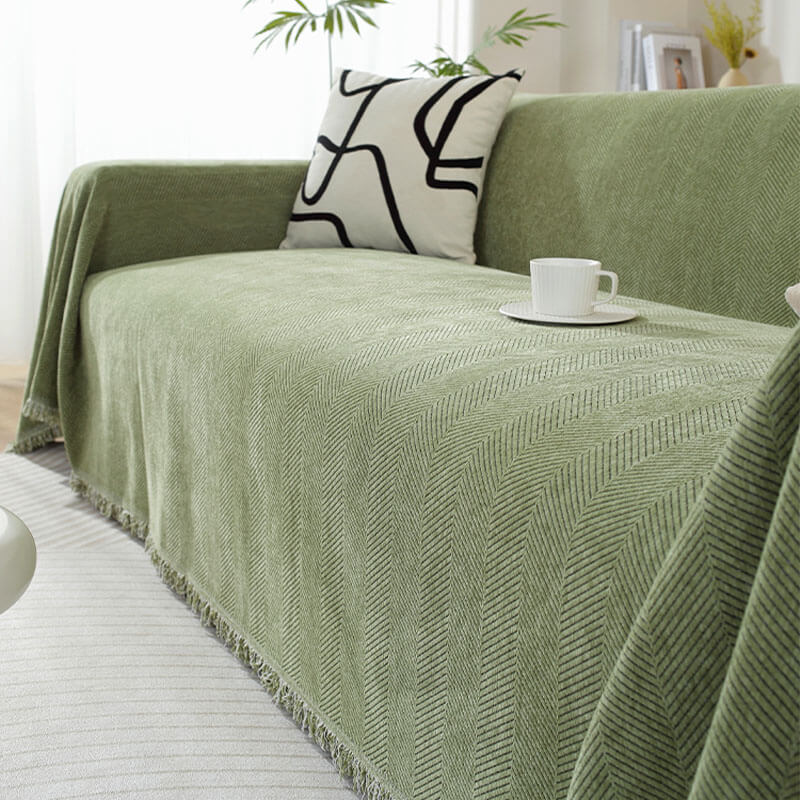 Housse de canapé en chenille motif chevrons avec franges
