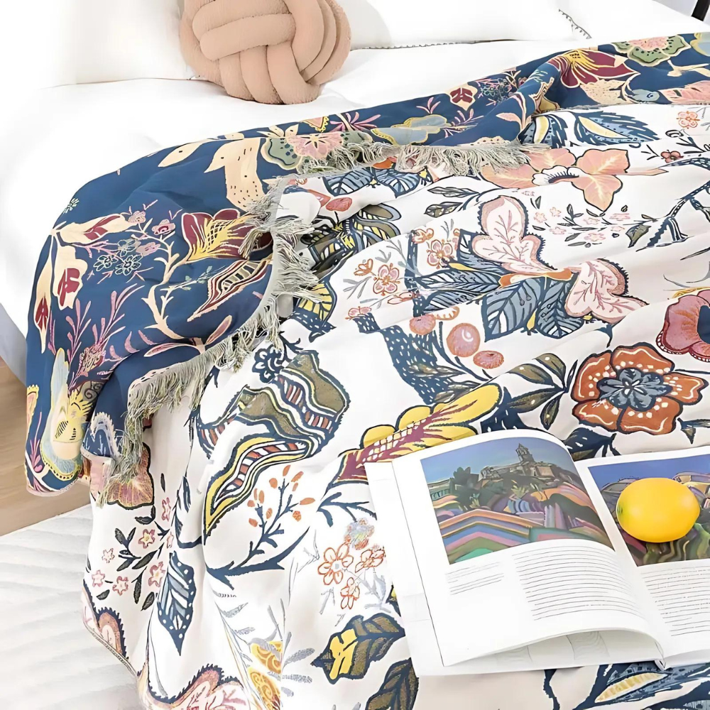 Coperta con nappine in cotone floreale