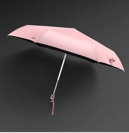 Paraguas de viaje plegable, resistente al viento y a los rayos UV, color rosa