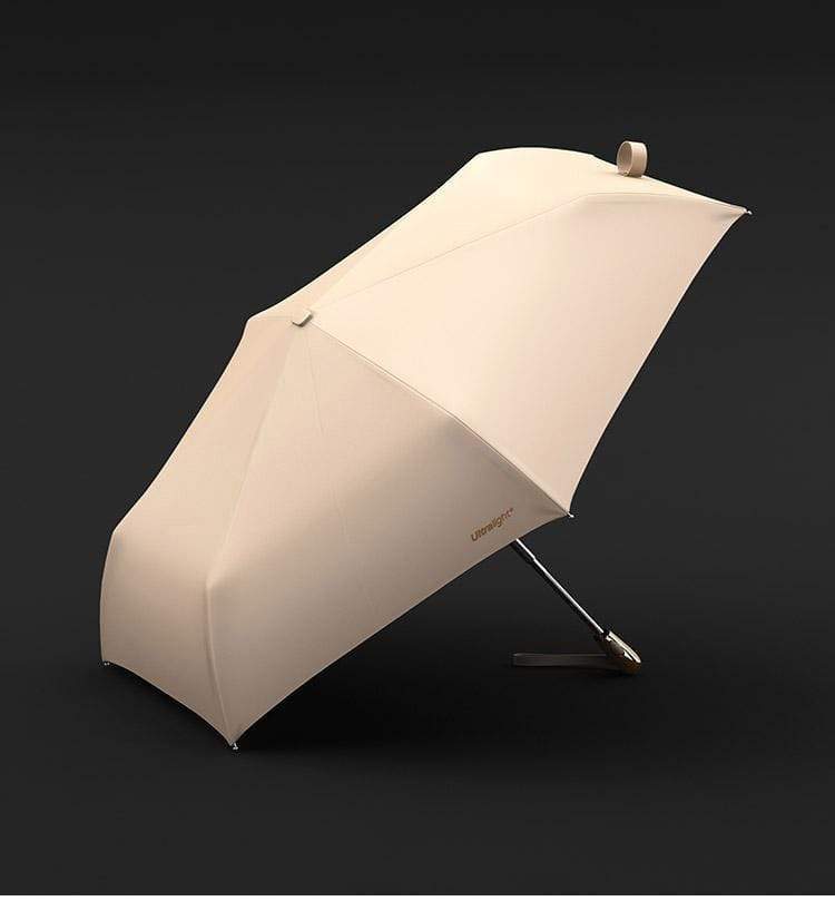 Paraguas de viaje plegable, resistente al viento y a los rayos UV, color rosa