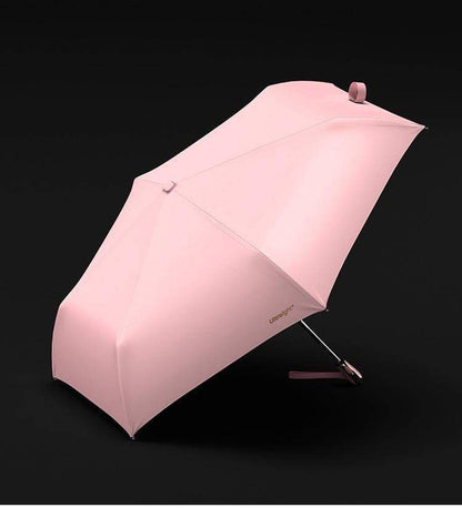 Paraguas de viaje plegable, resistente al viento y a los rayos UV, color rosa