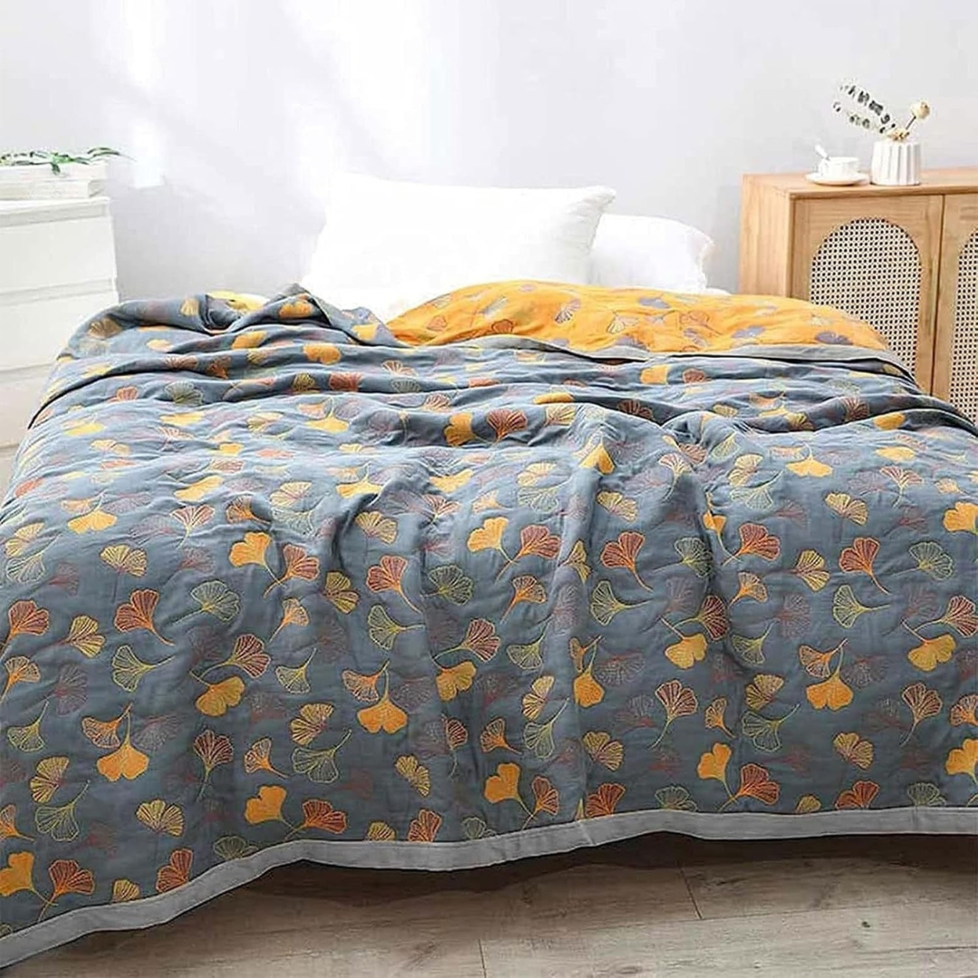 Manta reversible de algodón con estampado floral
