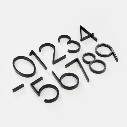 Números de casa modernos de metal negro estilo flotante