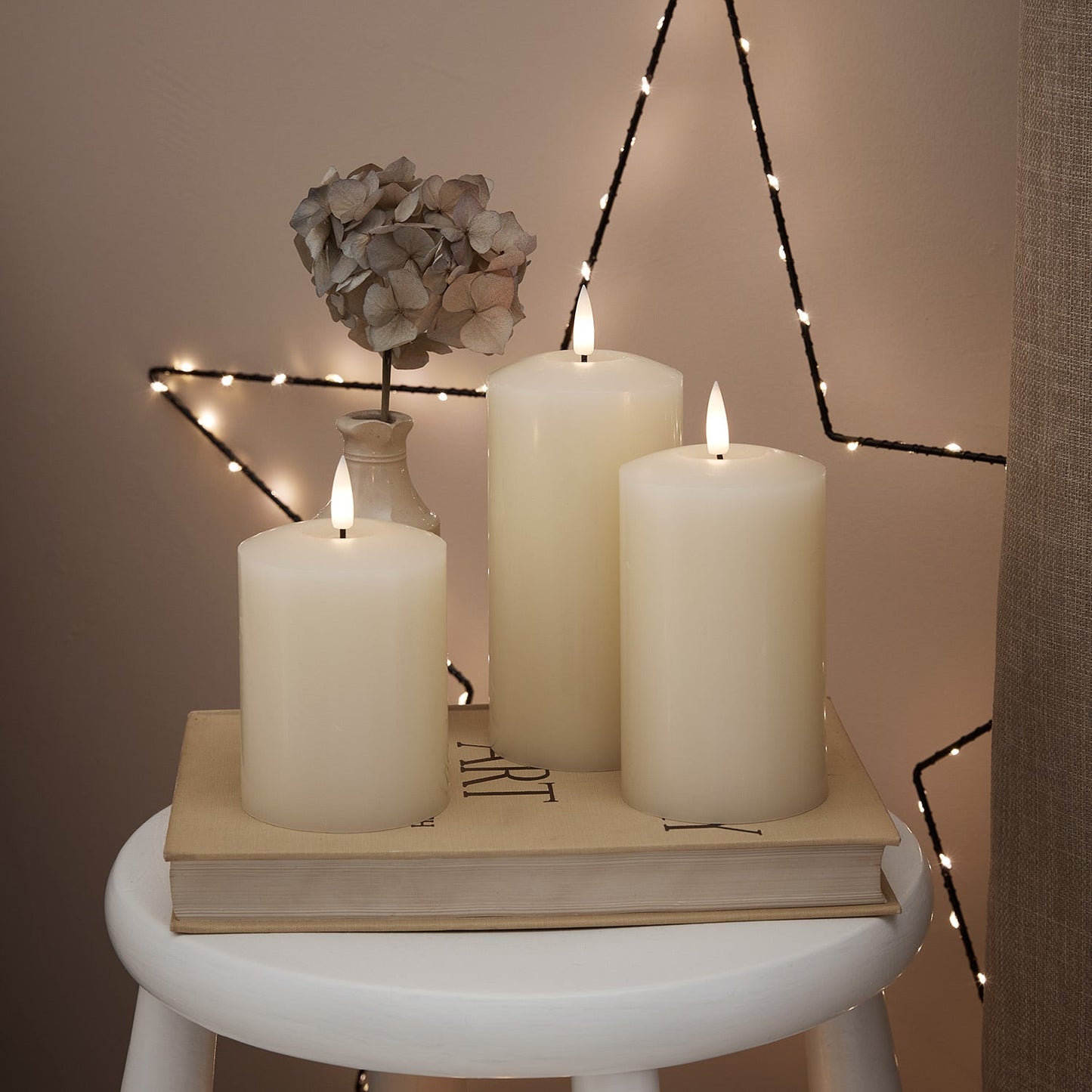 CA18013_truglow-led-pillar-candle-trio--white-stool_1_2000x2000_a9bfed22-ffc0-46f0-ae6a-25b4bb146ba6.jpg