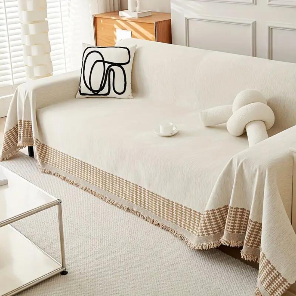 Rustykalny bawełniany pokrowiec na sofę z frędzlami