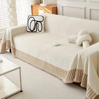 Rustykalny bawełniany pokrowiec na sofę z frędzlami