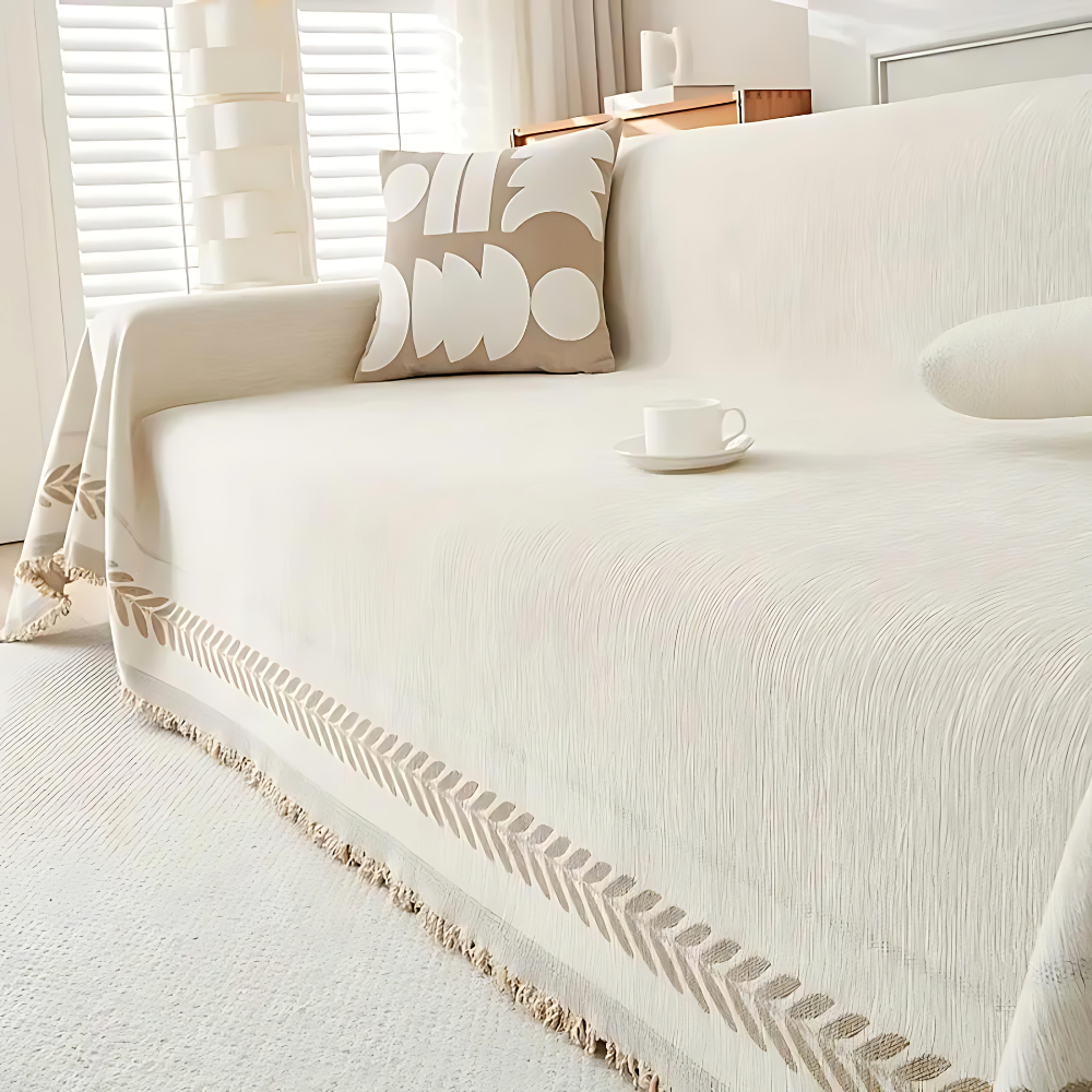 Rustykalny bawełniany pokrowiec na sofę z frędzlami