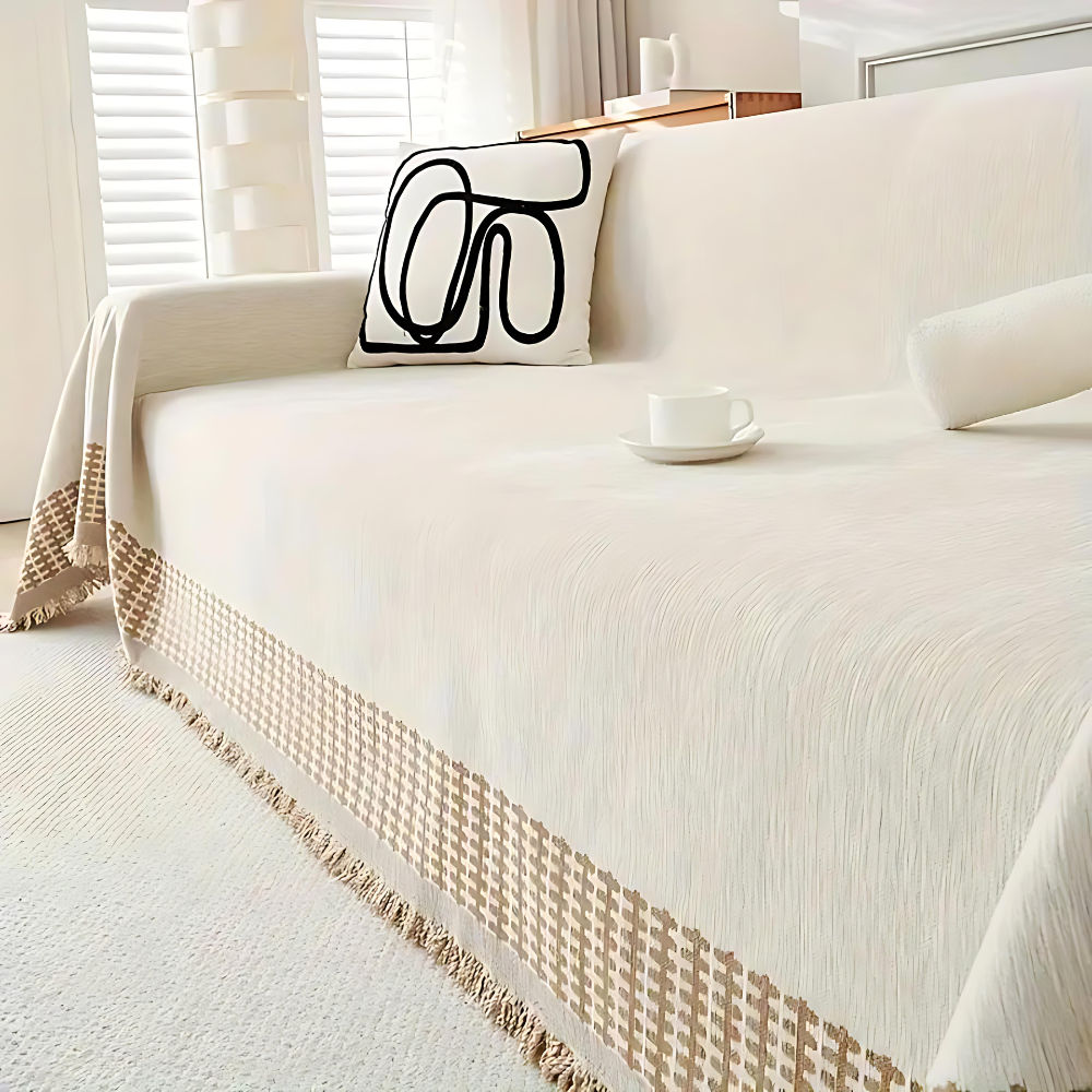 Rustykalny bawełniany pokrowiec na sofę z frędzlami