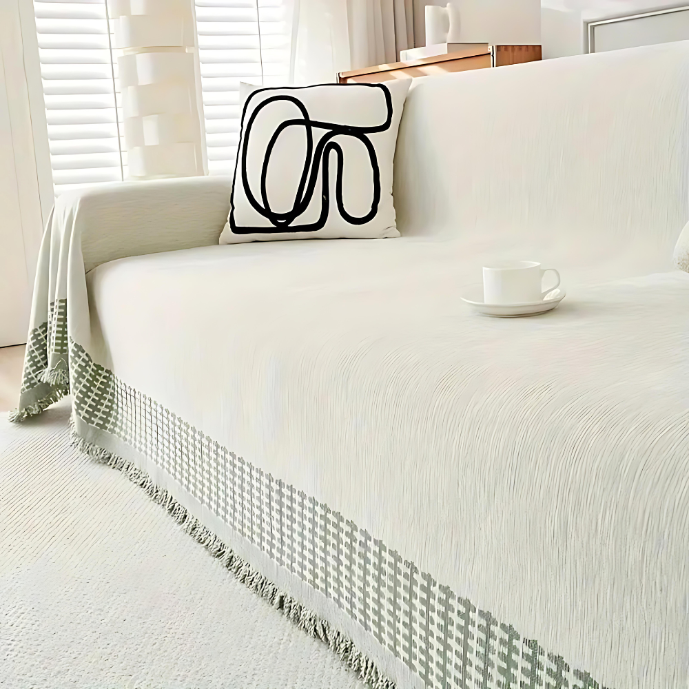 Rustykalny bawełniany pokrowiec na sofę z frędzlami